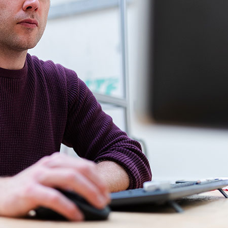 Project manager working from his computer